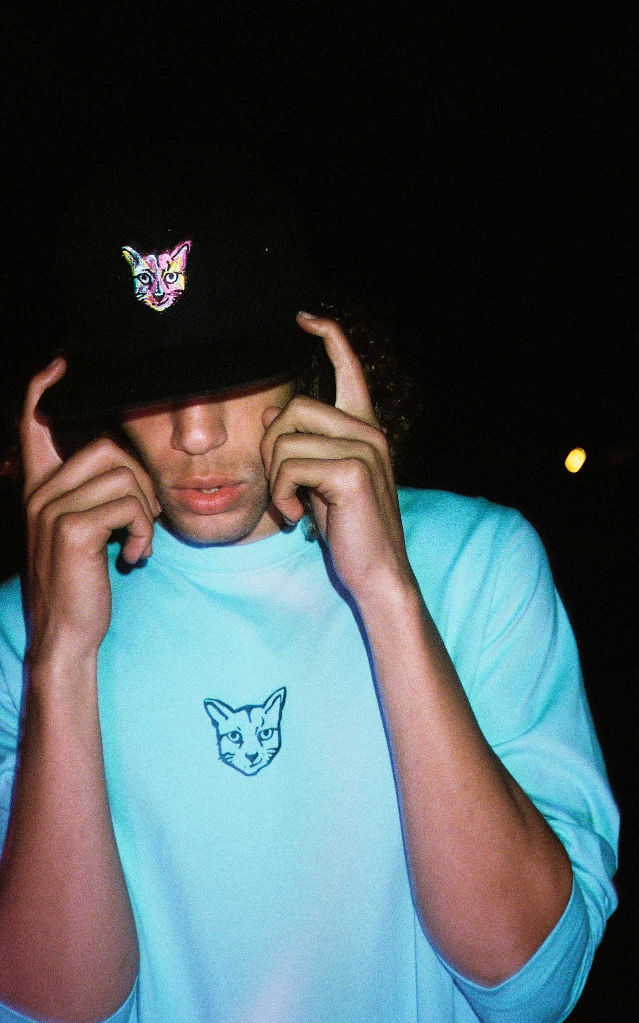 TURQUOISE LONGSLEEVE RUBBER CAT
