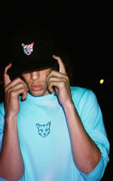 TURQUOISE LONGSLEEVE RUBBER CAT